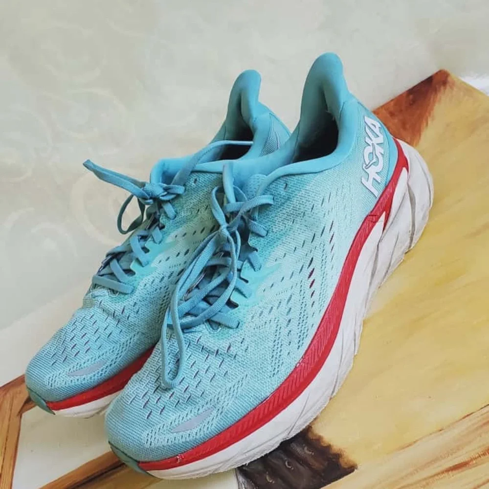 Hoka Light Blue with Red Accents Running Shoes Size 11B.